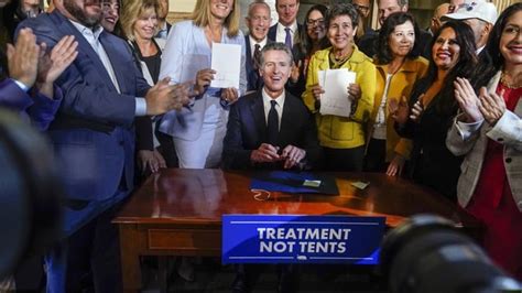 California governor signs 2 major proposals for mental health reform to go before voters in 2024